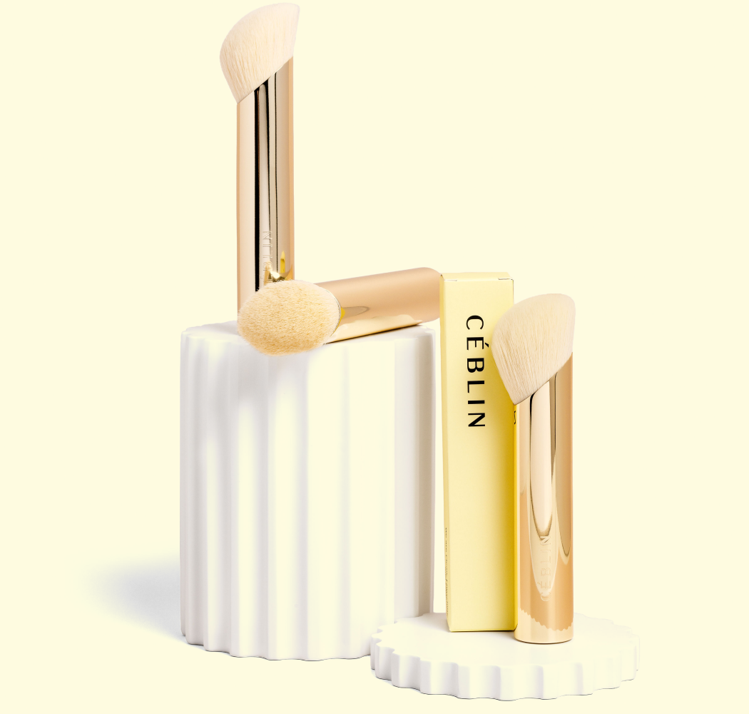 CÉBLIN iconic face brush set on white sculptural display